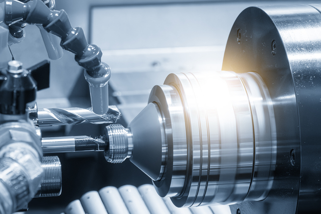 Close up scene multi-tasking CNC lathe machine swiss type hole d